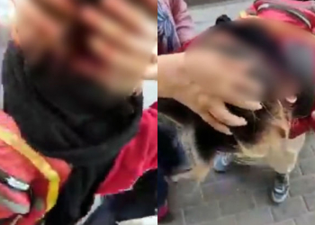 İranda əxlaq polisi etiraz edən qadının başını yardı - Video
